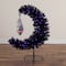 4ft. Pre-Lit Artificial Halloween Black Moon & Skull Tree with 250 Orange & Purple LED Lights